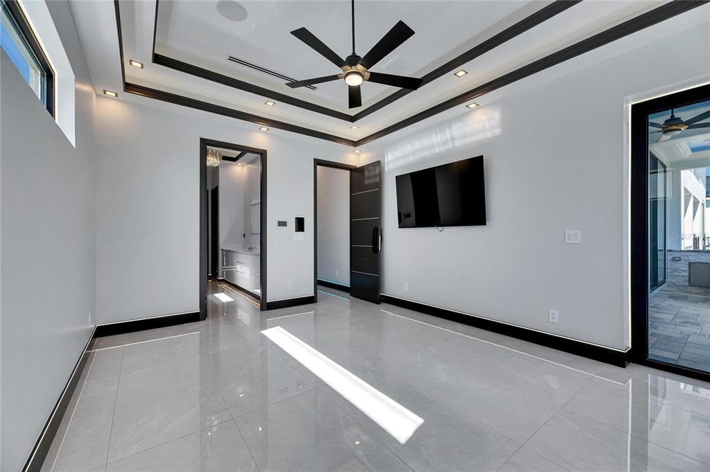 6538 Simone Shores Circle Apollo Beach, FL 33572 - Photo 31 of 88 a view of a livingroom with a flat screen tv