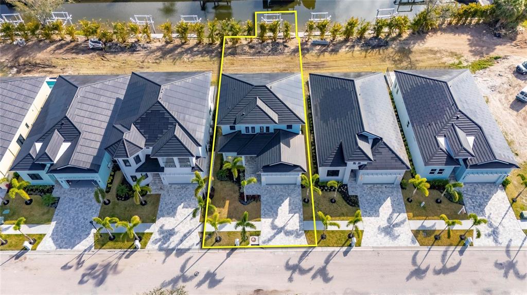 6538 Simone Shores Circle Apollo Beach, FL 33572 - Photo 85 of 88 an aerial view of residential houses with outdoor space