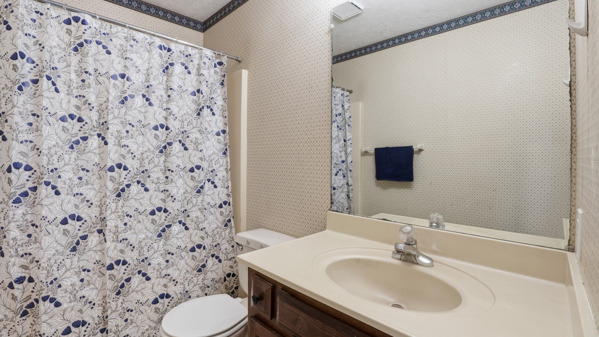 213 Maple Springs Drive Manchester, TN 37355 - Photo 25 of 58 a bathroom with a sink toilet and mirror