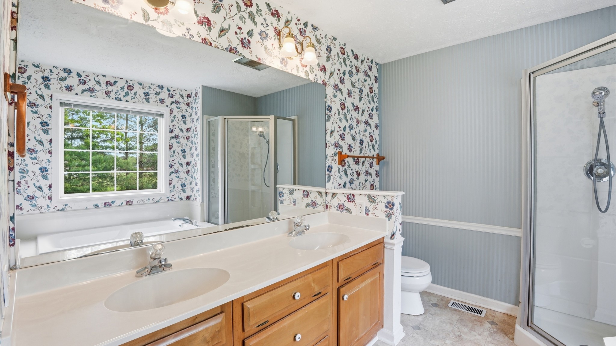 213 Maple Springs Drive Manchester, TN 37355 - Photo 31 of 58 a bathroom with a sink toilet and shower