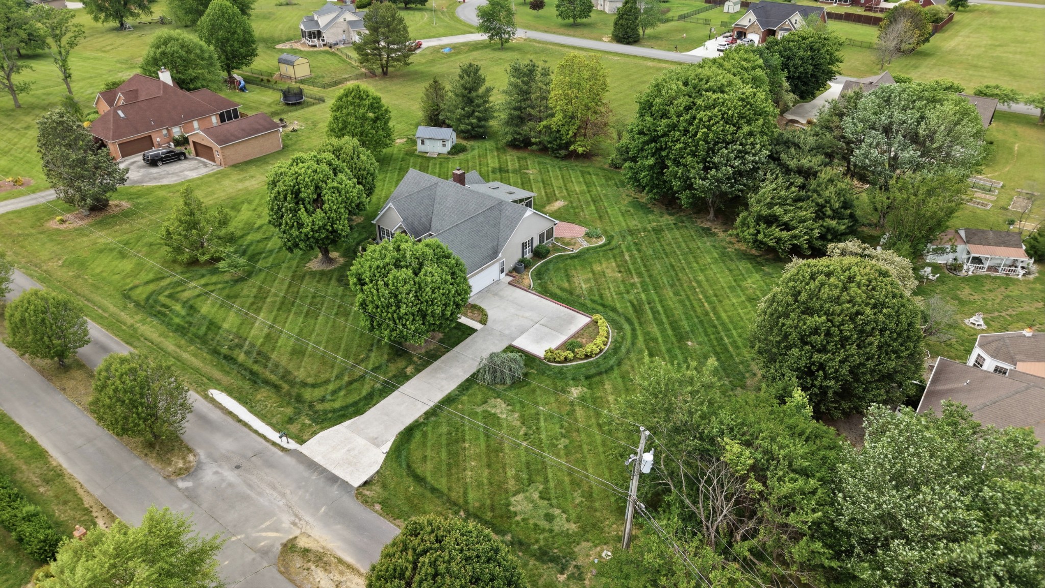 213 Maple Springs Drive Manchester, TN 37355 - Photo 50 of 58 an aerial view of a house with a yard