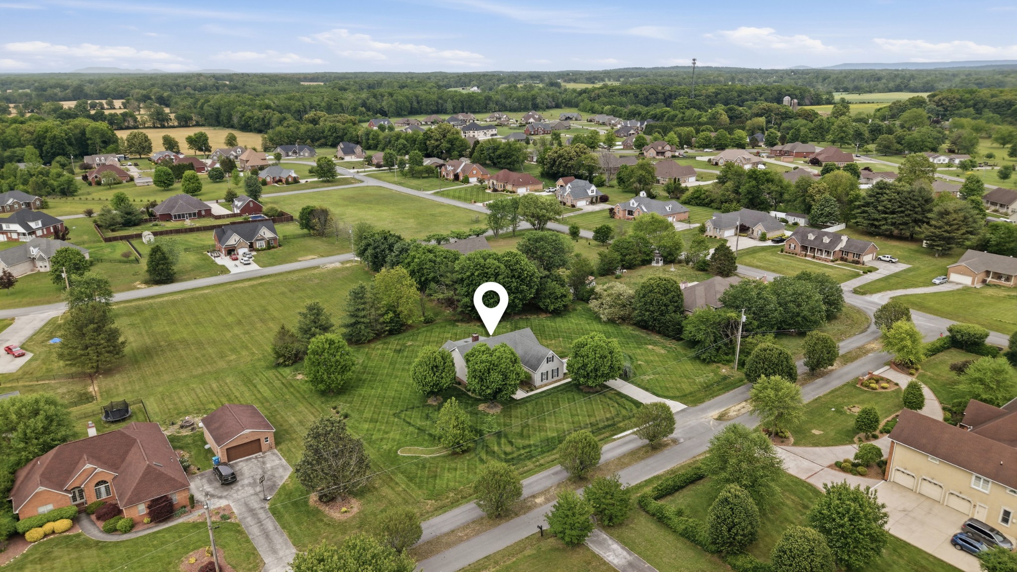 213 Maple Springs Drive Manchester, TN 37355 - Photo 54 of 58 an aerial view of a house with a yard