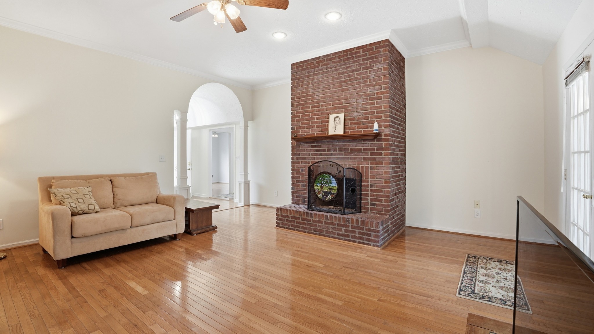 213 Maple Springs Drive Manchester, TN 37355 - Photo 7 of 58 a living room with furniture and a fireplace
