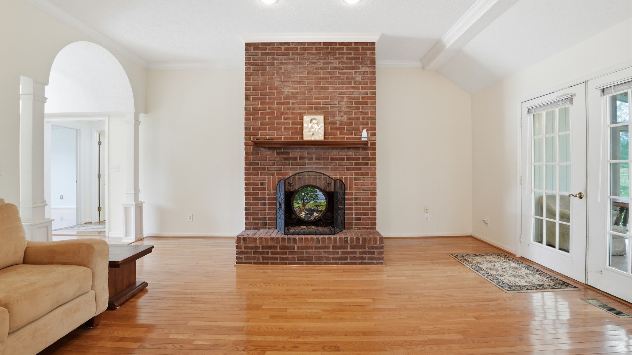 213 Maple Springs Drive Manchester, TN 37355 - Photo 8 of 58 a living room with furniture and a fireplace