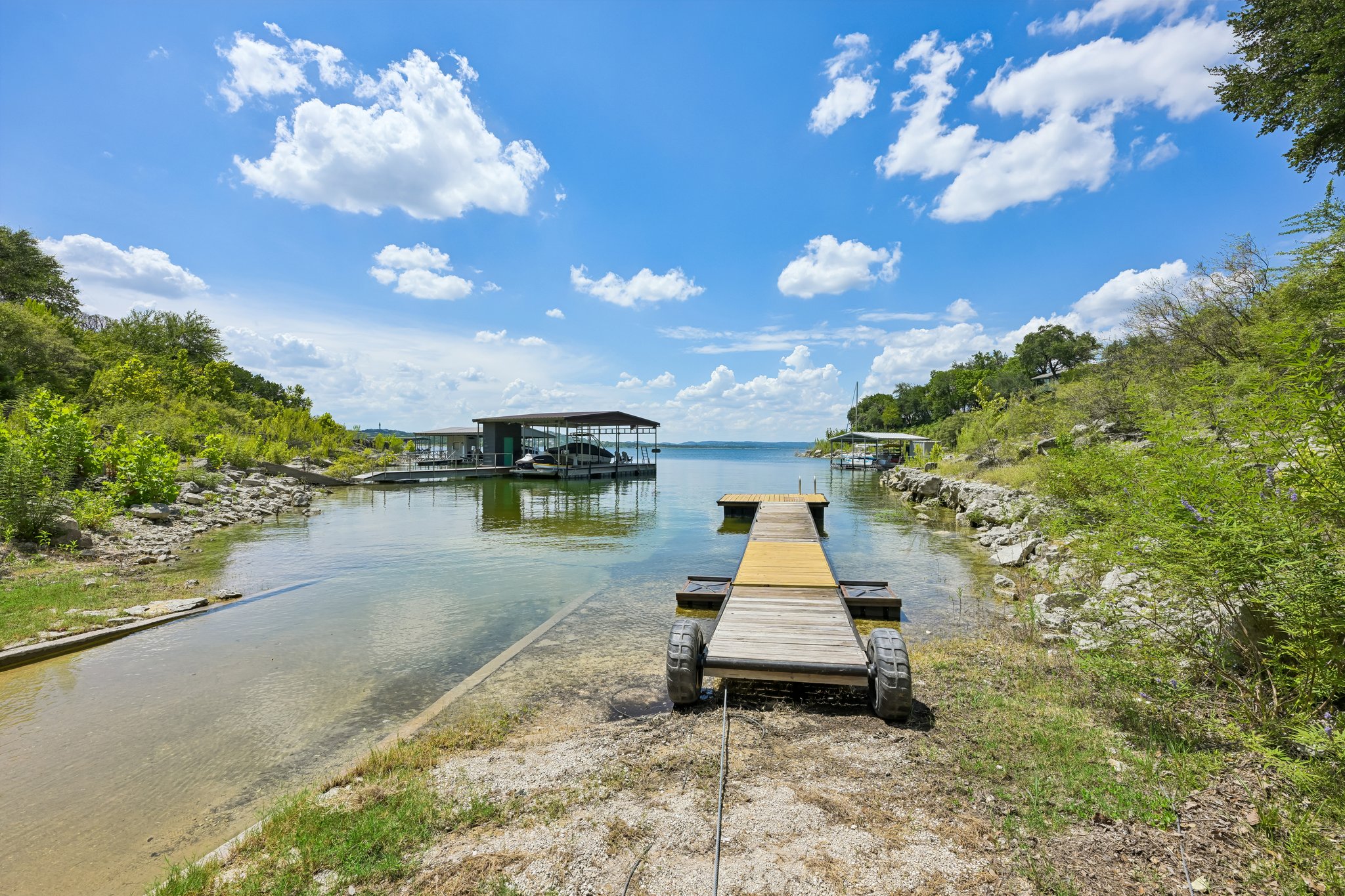 13101 Travis View Loop Austin, TX 78732 - Photo 25 of 27 The community boat launch dock extends into a quiet Lake Travis cove.