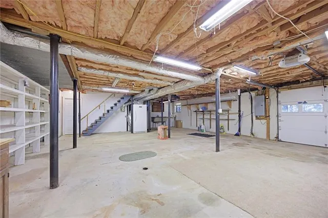 a view of a room with wooden walls