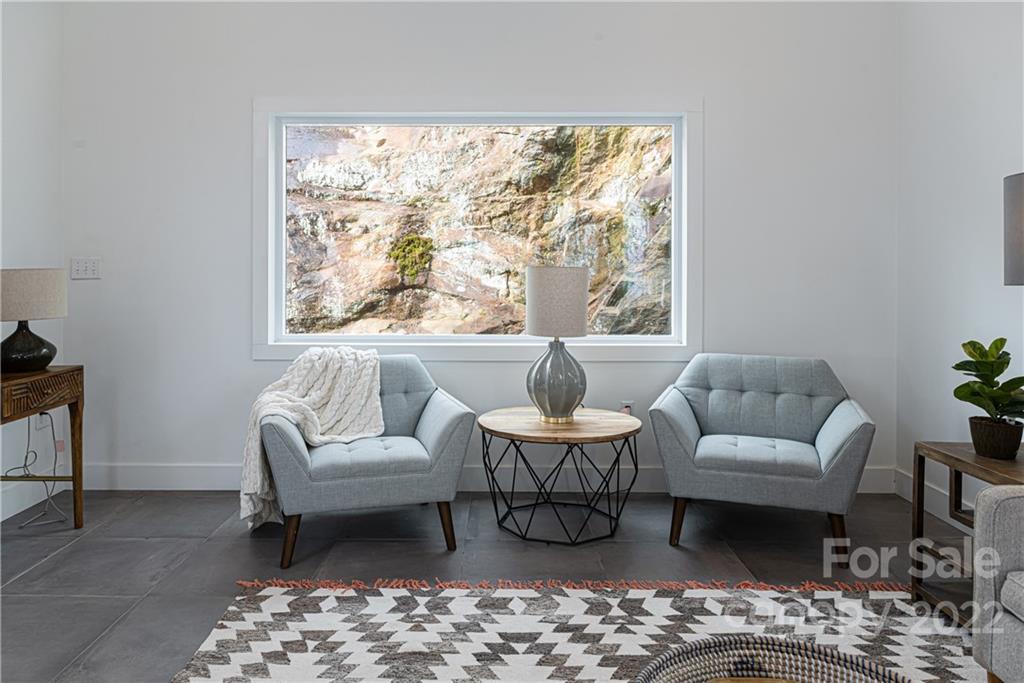 170 South Delano Road Asheville, NC 28805 - Photo 12 of 48 a living room with furniture and a large window
