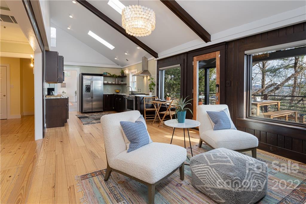 170 South Delano Road Asheville, NC 28805 - Photo 18 of 48 a living room with furniture and a large window