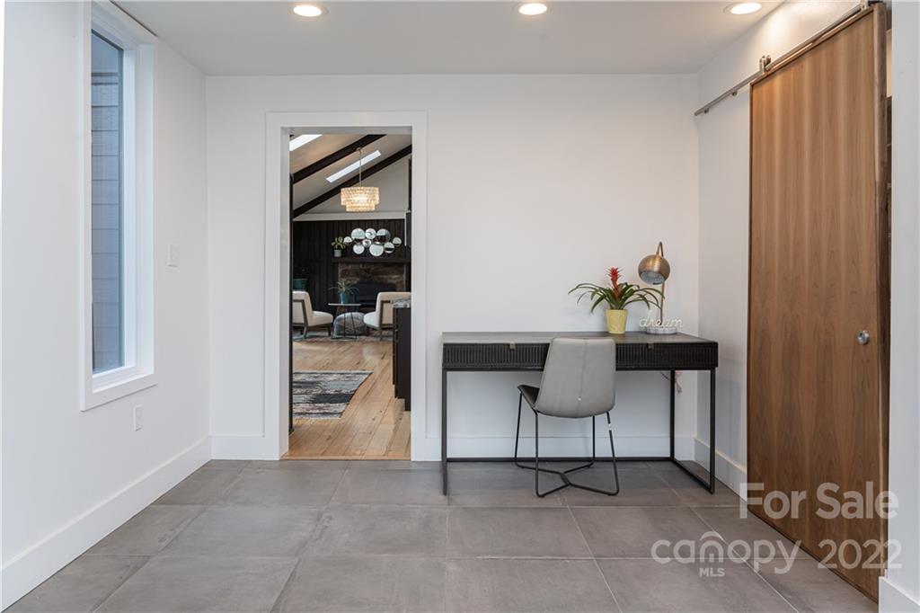 170 South Delano Road Asheville, NC 28805 - Photo 44 of 48 a living room with furniture and a window