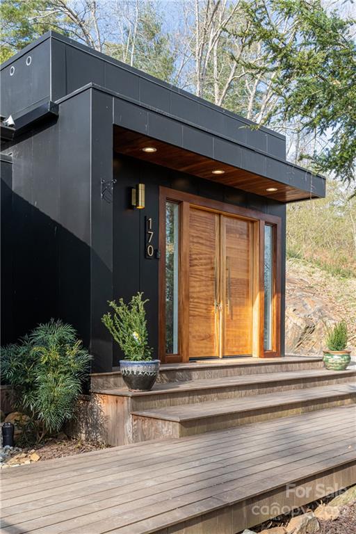 170 South Delano Road Asheville, NC 28805 - Photo 48 of 48 a view of a house with a potted plant