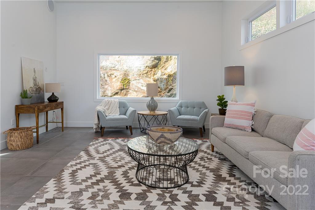 170 South Delano Road Asheville, NC 28805 - Photo 10 of 48 a living room with furniture and a window