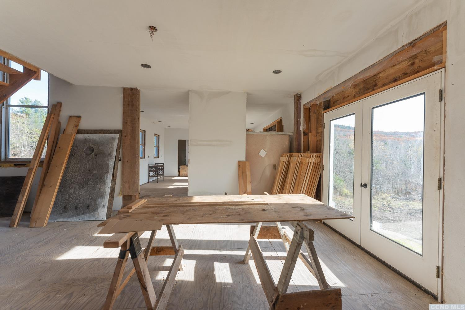 1174 Potter Mountain Road Gilboa, NY 12076 - Photo 24 of 94 a view of a dining room with furniture and a window