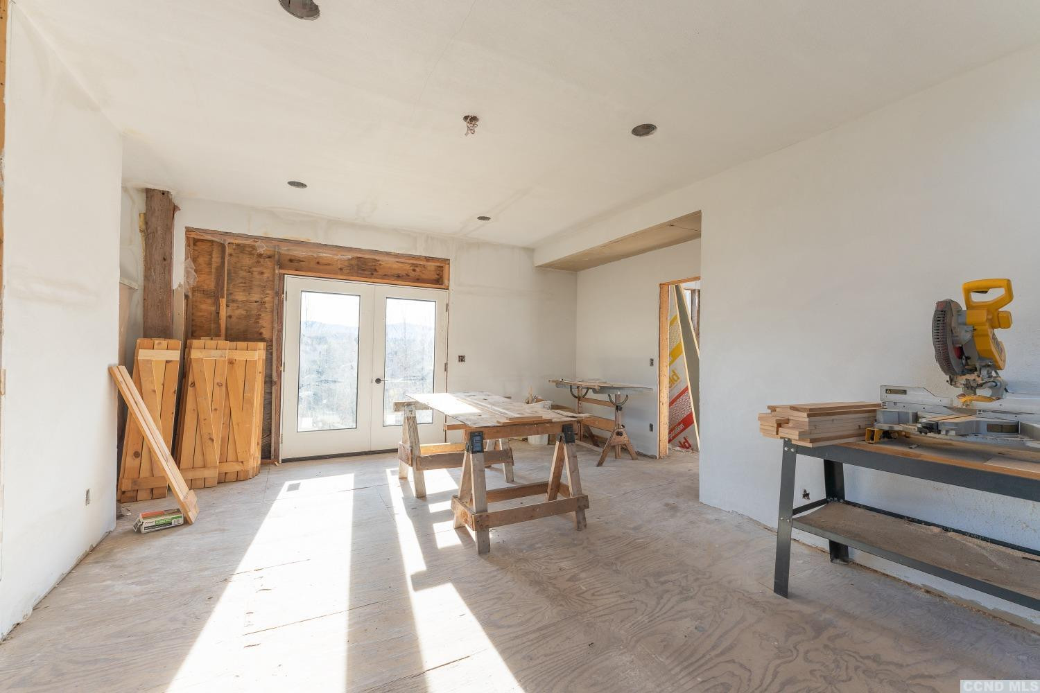 1174 Potter Mountain Road Gilboa, NY 12076 - Photo 27 of 94 a view of a workspace with furniture and a window