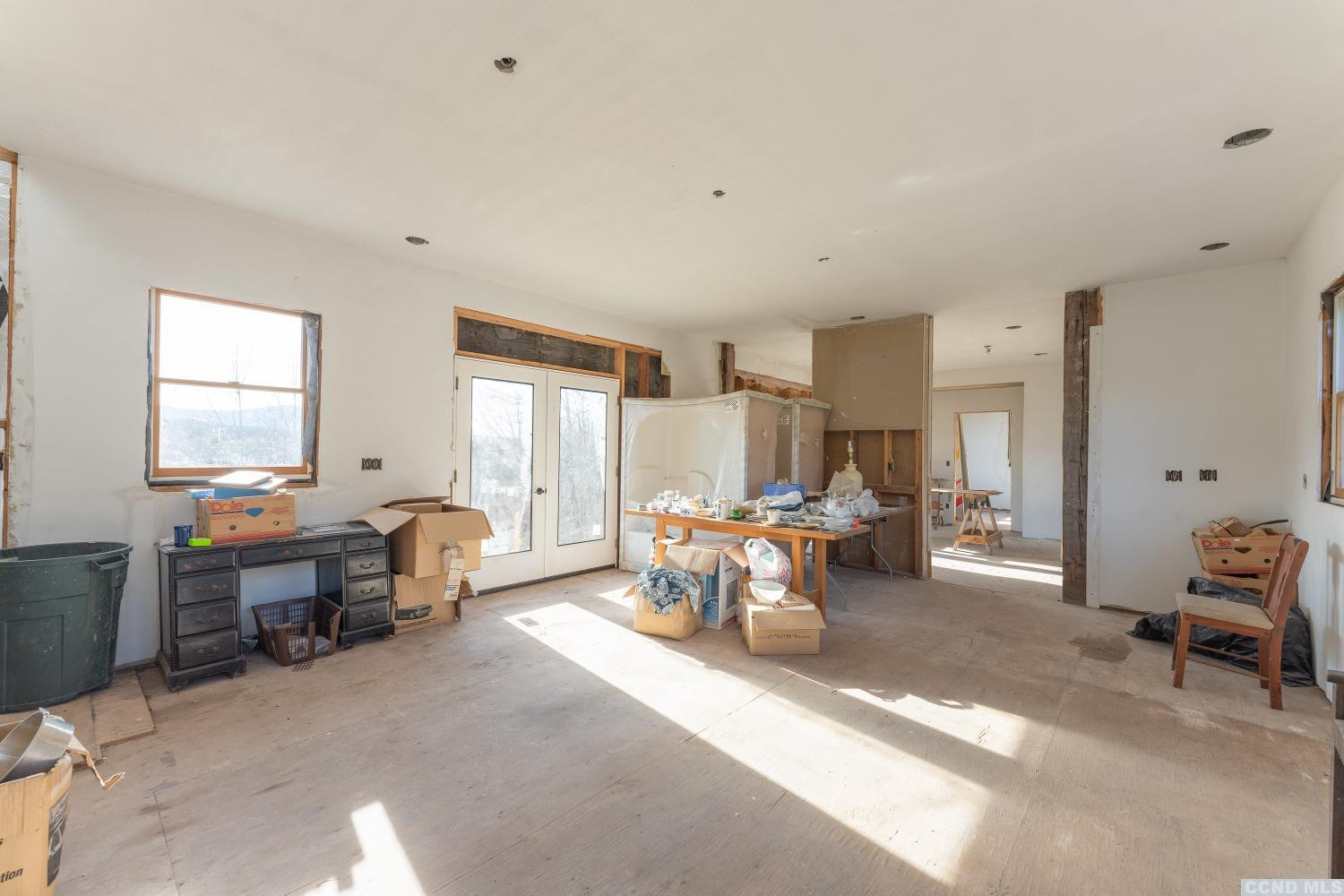 1174 Potter Mountain Road Gilboa, NY 12076 - Photo 30 of 94 a living room with furniture and a large window