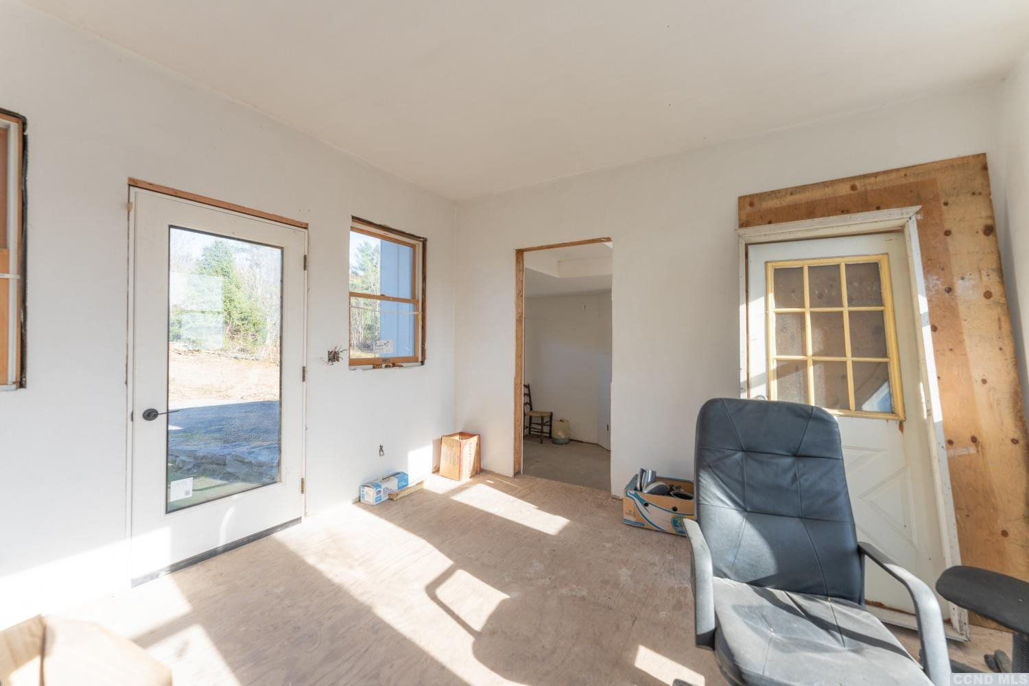 1174 Potter Mountain Road Gilboa, NY 12076 - Photo 35 of 94 a bedroom with a bed and glass window