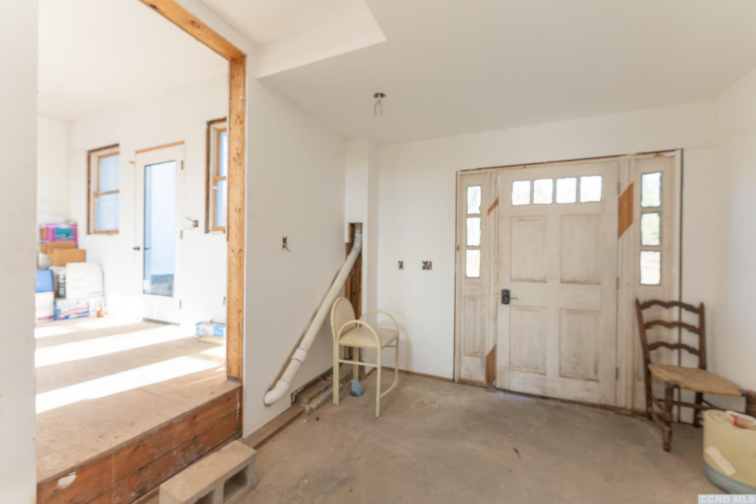 1174 Potter Mountain Road Gilboa, NY 12076 - Photo 36 of 94 a view of a livingroom with a hall and an entryway