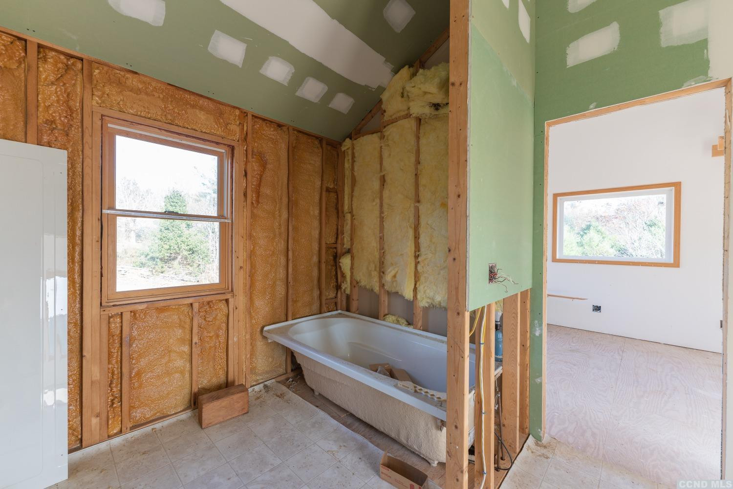 1174 Potter Mountain Road Gilboa, NY 12076 - Photo 48 of 94 a spacious bedroom with a bed and a window