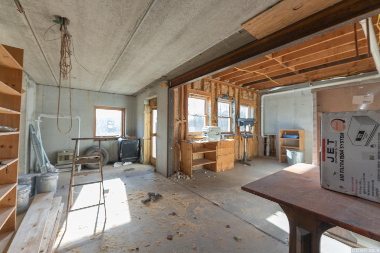 1174 Potter Mountain Road Gilboa, NY 12076 - Photo 73 of 94 a living room with furniture a table and chairs