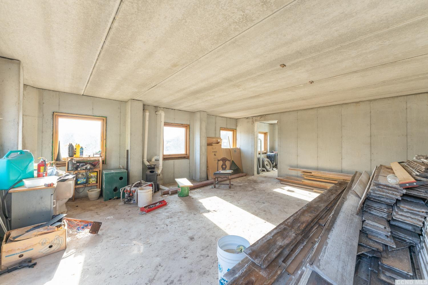 1174 Potter Mountain Road Gilboa, NY 12076 - Photo 75 of 94 a living room with hard wood flooring and furniture