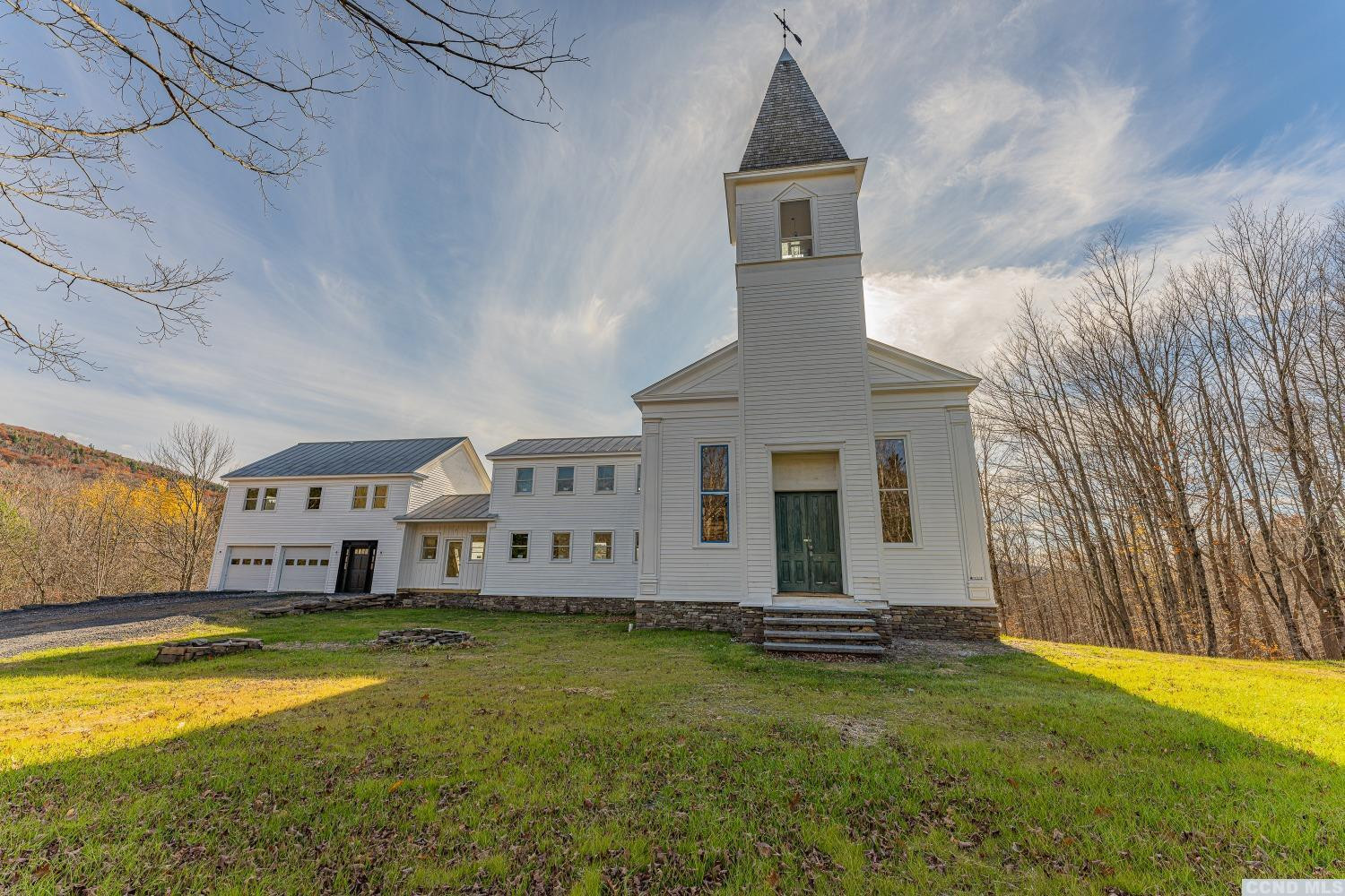 1174 Potter Mountain Road Gilboa, NY 12076 - Photo 10 of 94 a front view of a house with a yard