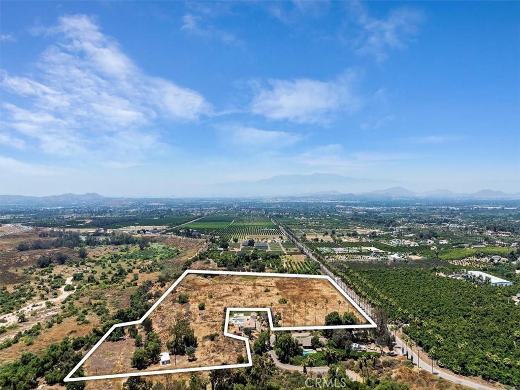1350 Firethorn Avenue Riverside, CA 92504 - Photo 4 of 16 an aerial view of a residential houses with city view