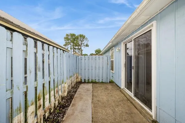 a view of a wooden fence