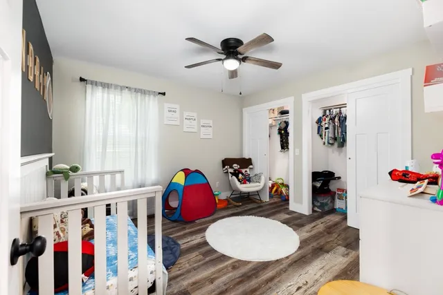 a view of a dining room with furniture and workspace