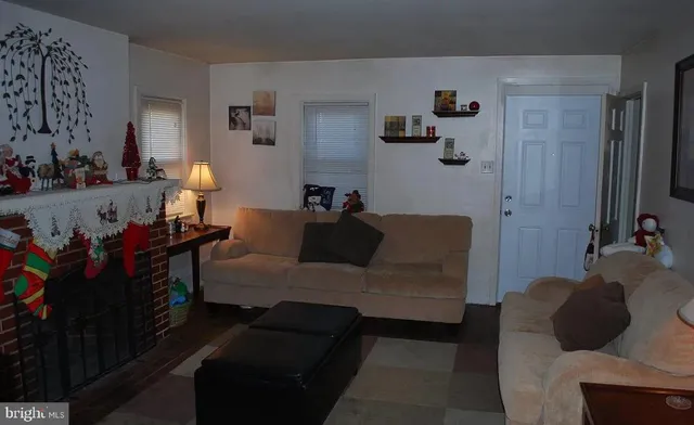 a table with wine bottles and glasses on it