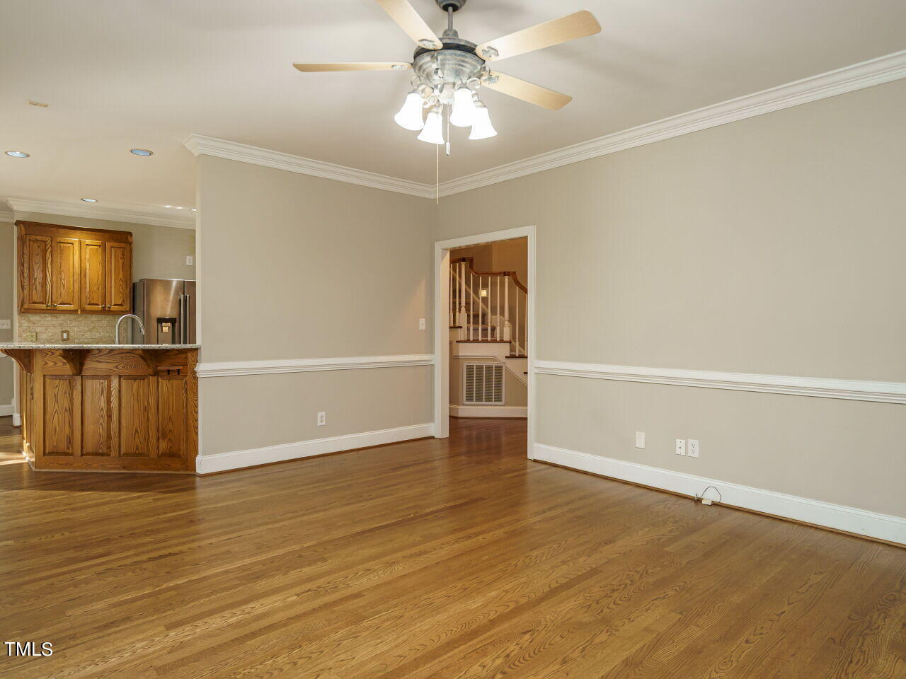 2320 Primrose Valley Court Raleigh, NC 27613 - Photo 19 of 43 wooden floor in an empty room with a window