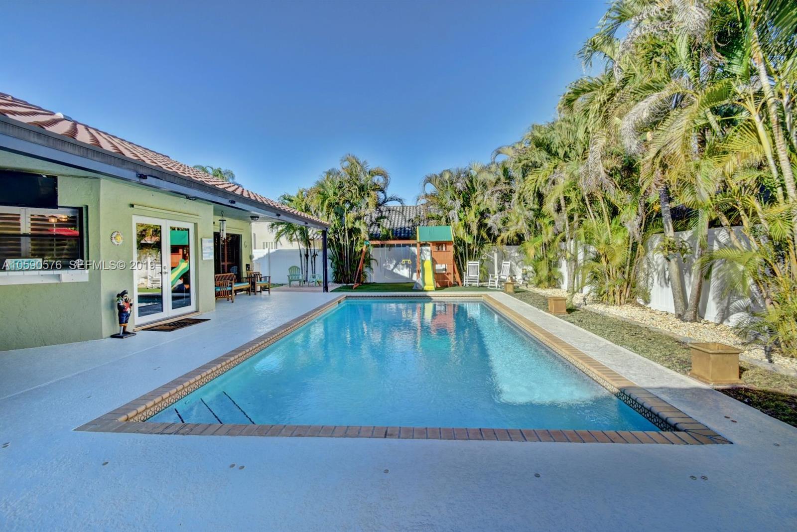 22324 Boyaca Avenue Boca Raton, FL 33433 - Photo 36 of 51 a view of a living room and kitchen