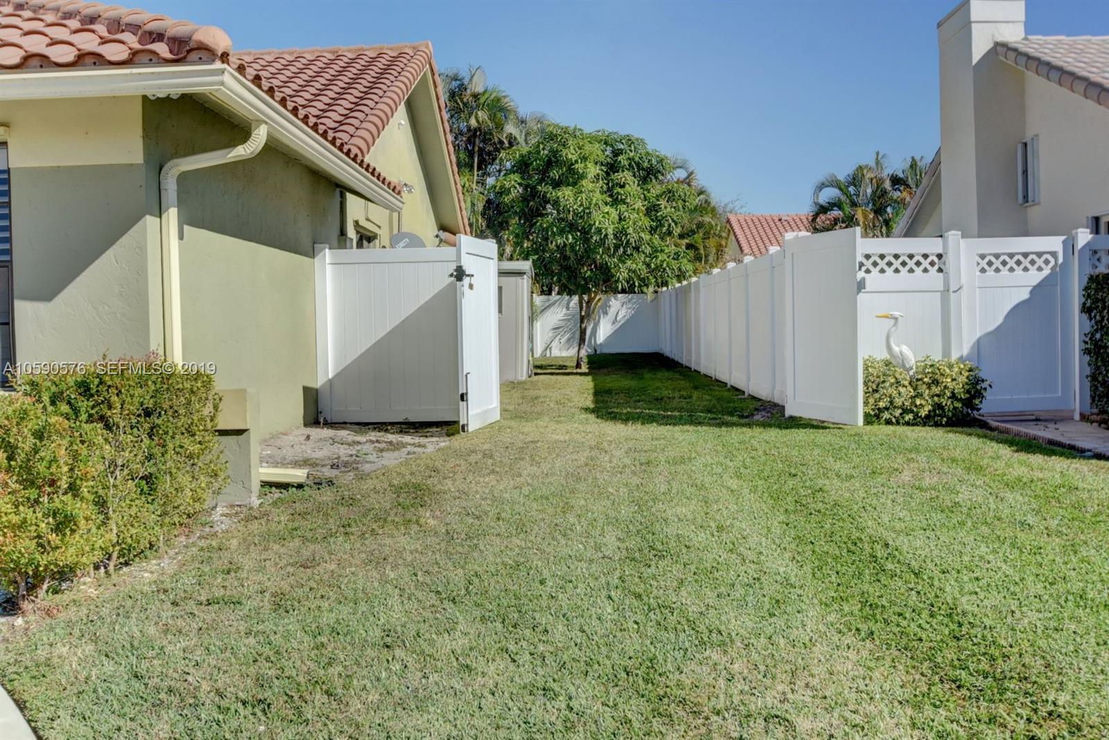 22324 Boyaca Avenue Boca Raton, FL 33433 - Photo 43 of 51 an outdoor space with garden view