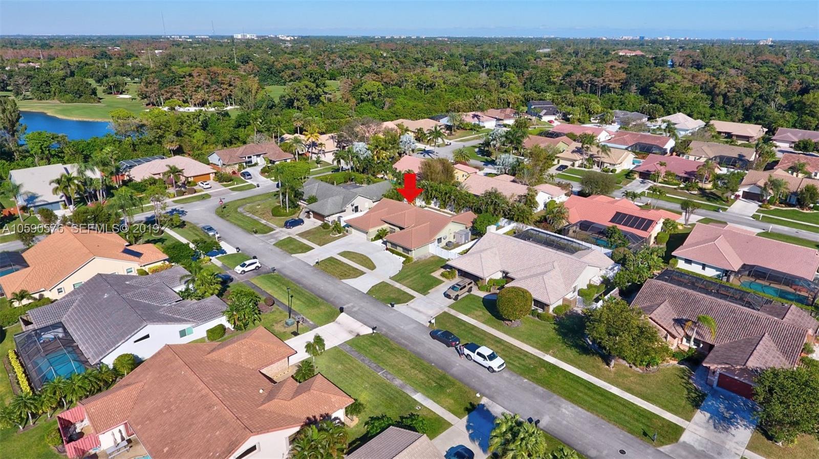 22324 Boyaca Avenue Boca Raton, FL 33433 - Photo 46 of 51 an aerial view of residential houses with outdoor space