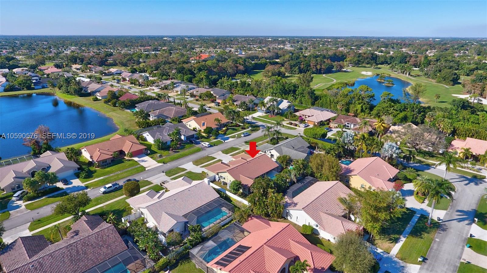 22324 Boyaca Avenue Boca Raton, FL 33433 - Photo 47 of 51 an aerial view of residential houses with outdoor space and trees all around