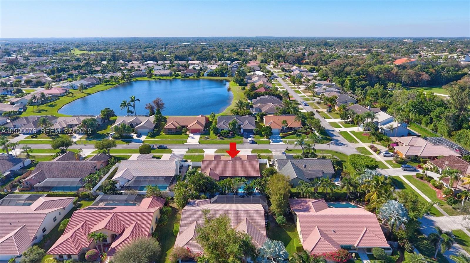22324 Boyaca Avenue Boca Raton, FL 33433 - Photo 48 of 51 an aerial view of residential houses with outdoor space and swimming pool