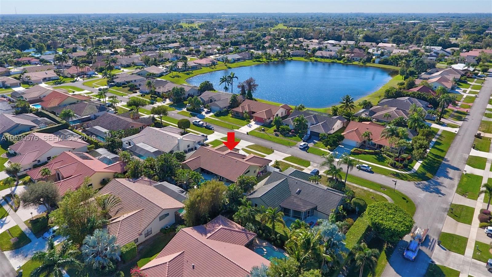 22324 Boyaca Avenue Boca Raton, FL 33433 - Photo 49 of 51 an aerial view of house with yard swimming pool and ocean view