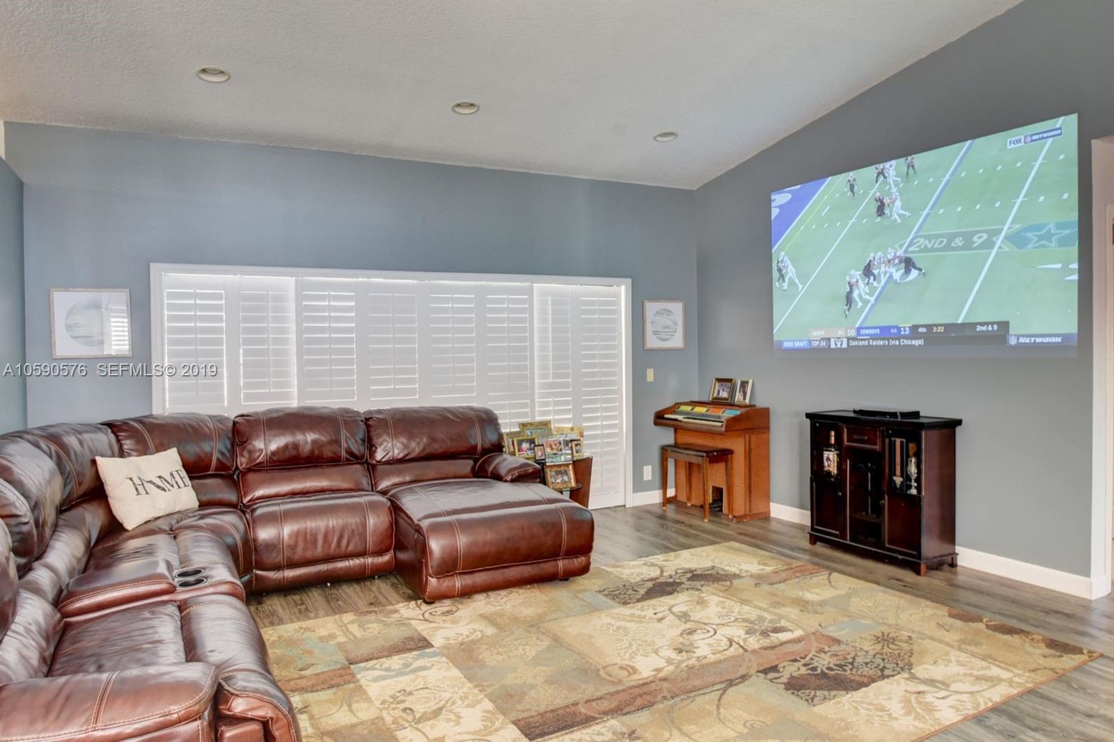 22324 Boyaca Avenue Boca Raton, FL 33433 - Photo 8 of 51 a living room with furniture window and fireplace
