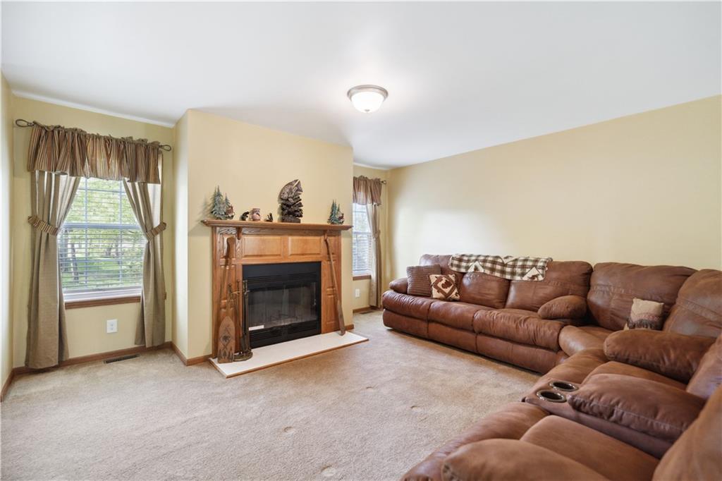 226 Cypress Road Addison, PA 15411 - Photo 11 of 31 a living room with furniture and a fireplace
