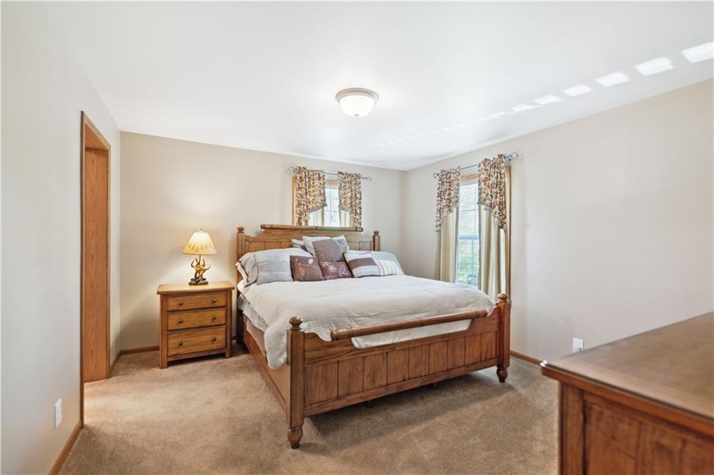 226 Cypress Road Addison, PA 15411 - Photo 13 of 31 a bedroom with a bed and a night stand