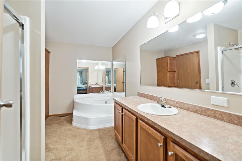 226 Cypress Road Addison, PA 15411 - Photo 16 of 31 a bathroom with a sink double vanity granite and a bathtub