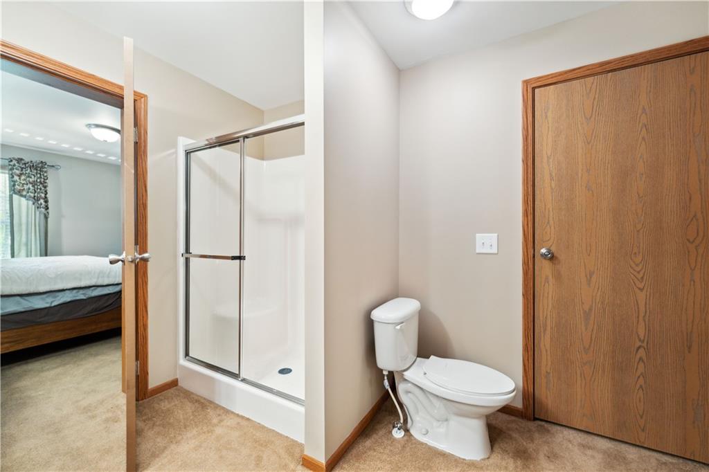226 Cypress Road Addison, PA 15411 - Photo 18 of 31 a bathroom with a toilet sink and shower