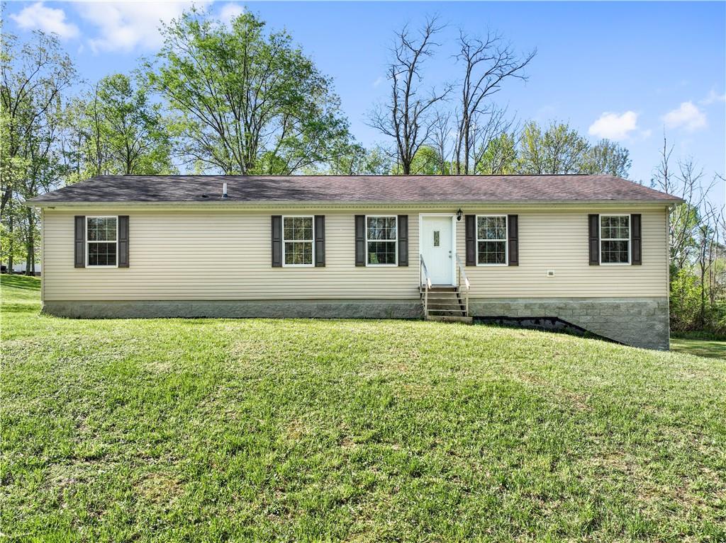 226 Cypress Road Addison, PA 15411 - Photo 2 of 31 front view of a house with a yard