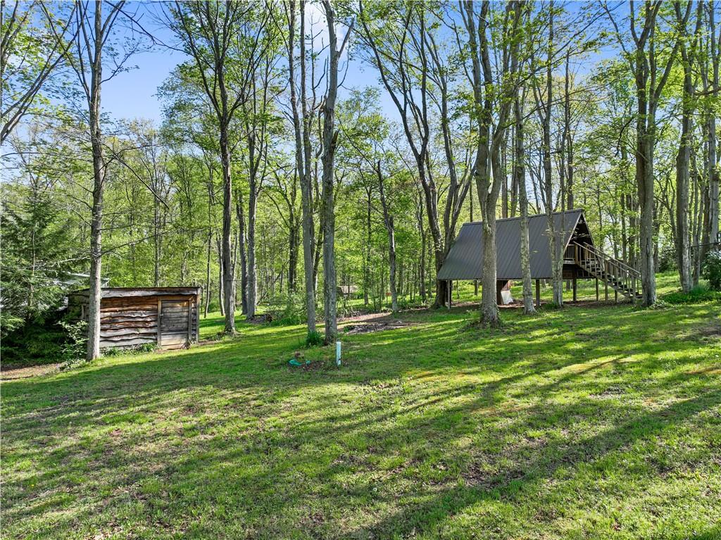 226 Cypress Road Addison, PA 15411 - Photo 25 of 31 a view of a house with a backyard