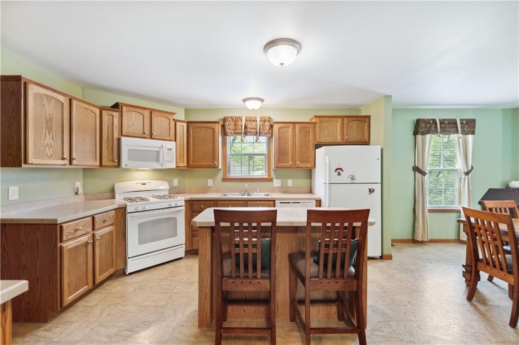 226 Cypress Road Addison, PA 15411 - Photo 5 of 31 a kitchen that has a table and chairs in it