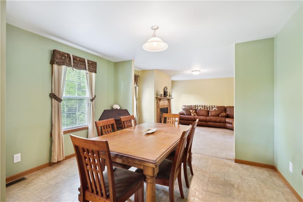 226 Cypress Road Addison, PA 15411 - Photo 9 of 31 a view of a dining room with furniture and wooden floor