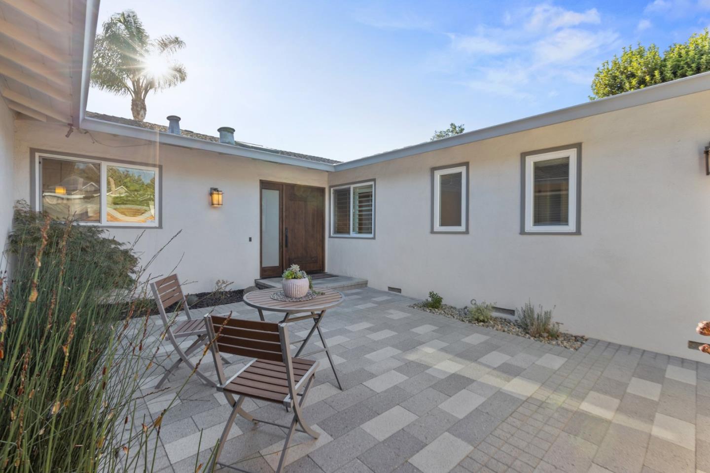 2219 Maykirk Road San Jose, CA 95124 - Photo 13 of 100 a backyard of a house with table and chairs