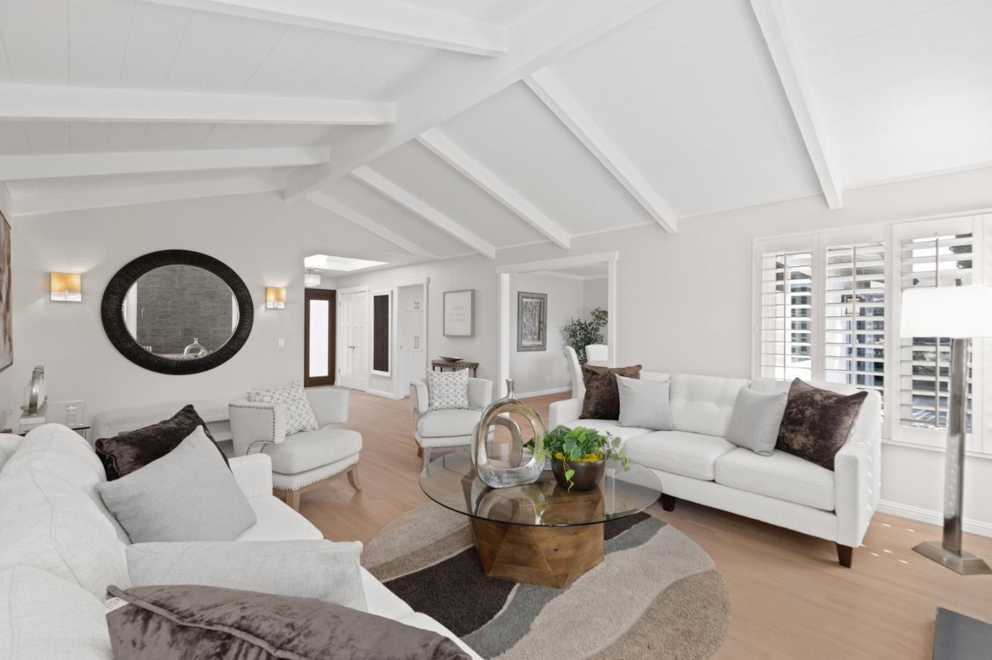 2219 Maykirk Road San Jose, CA 95124 - Photo 21 of 100 a living room with furniture a rug and a window
