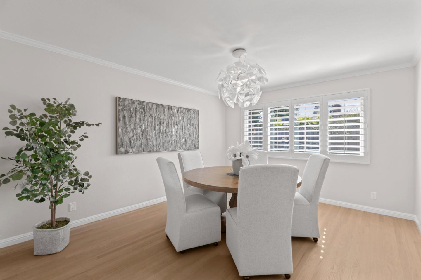 2219 Maykirk Road San Jose, CA 95124 - Photo 23 of 100 a dining room with furniture potted plants and wooden floor