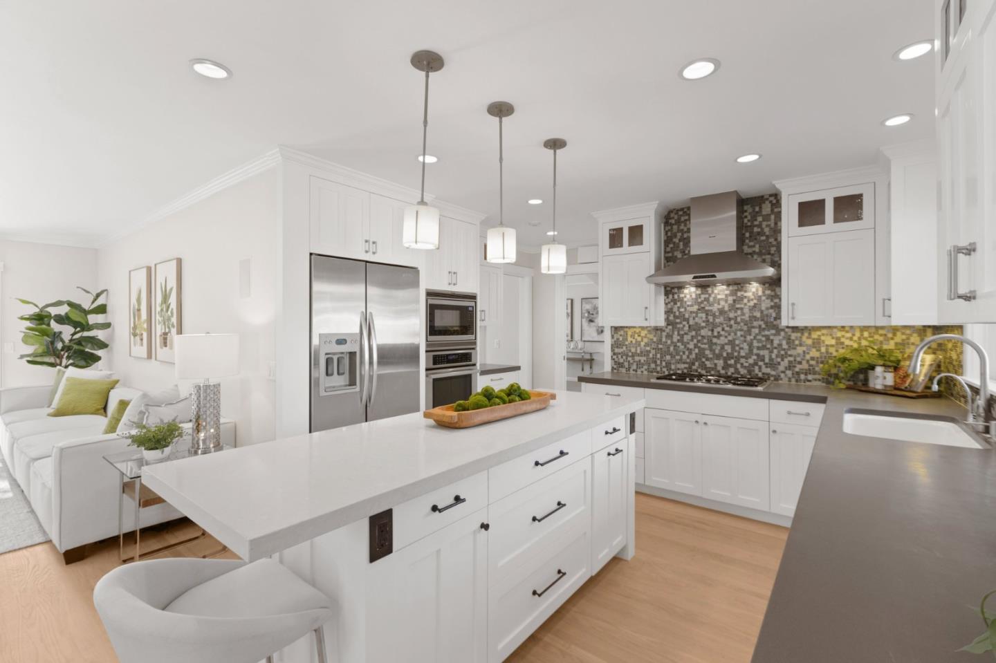2219 Maykirk Road San Jose, CA 95124 - Photo 26 of 100 a kitchen with stainless steel appliances kitchen island granite countertop a table and chairs in it