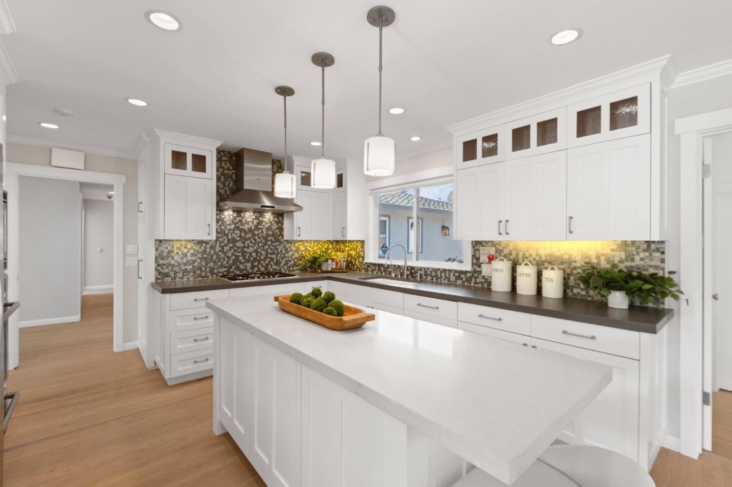 2219 Maykirk Road San Jose, CA 95124 - Photo 28 of 100 a kitchen with stainless steel appliances granite countertop a sink a stove and a wooden floors