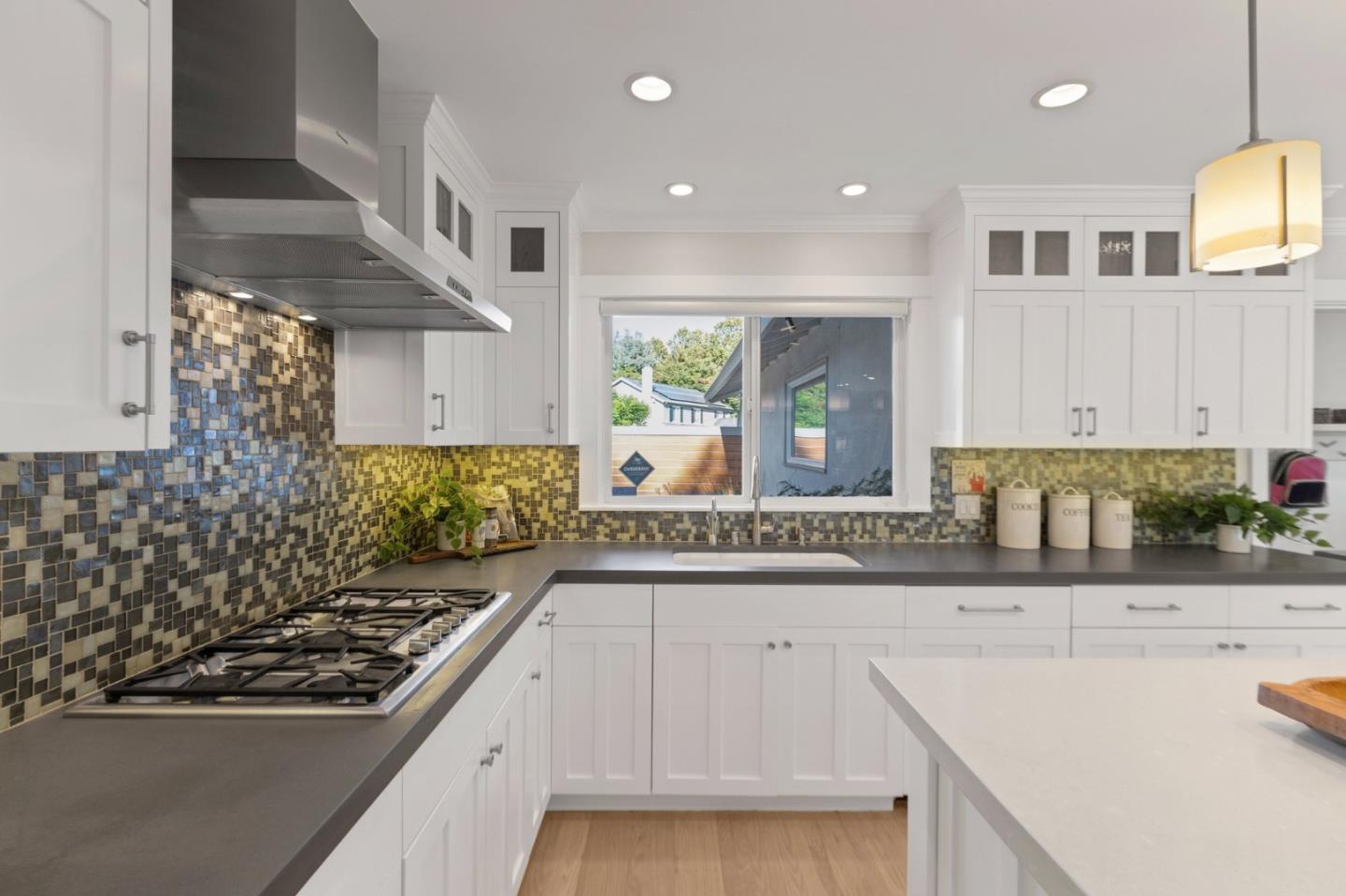 2219 Maykirk Road San Jose, CA 95124 - Photo 29 of 100 a large kitchen with stainless steel appliances kitchen island granite countertop a sink and cabinets